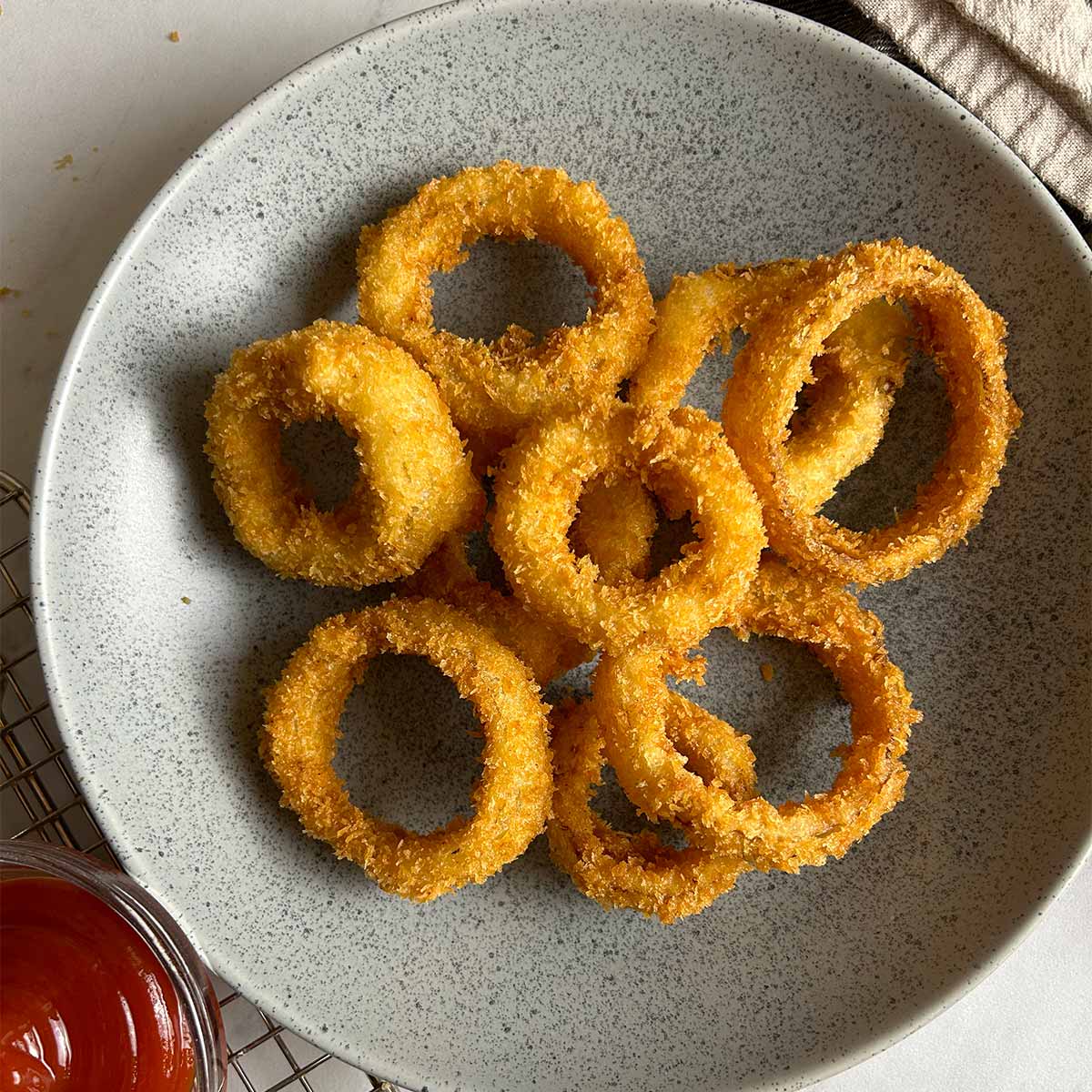 Perfectly Crispy Air Fried Frozen Onion Rings - Fabulessly Frugal