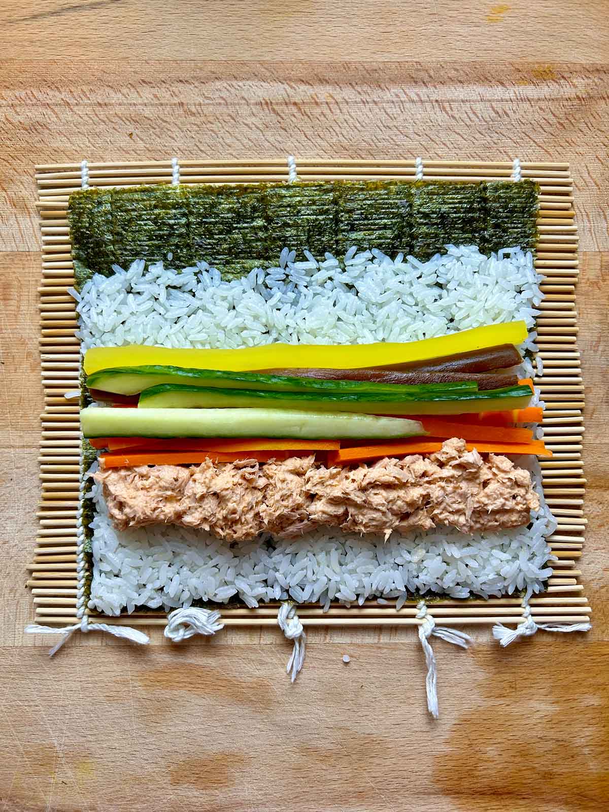 kimbap on bamboo rolling mat