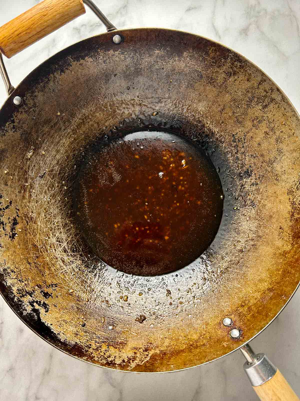 reduced cooking liquid in wok