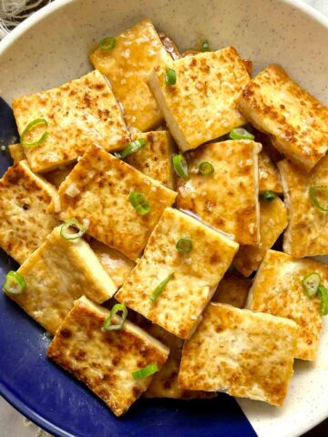 overhead shot of fried tofu in oyster sauce.