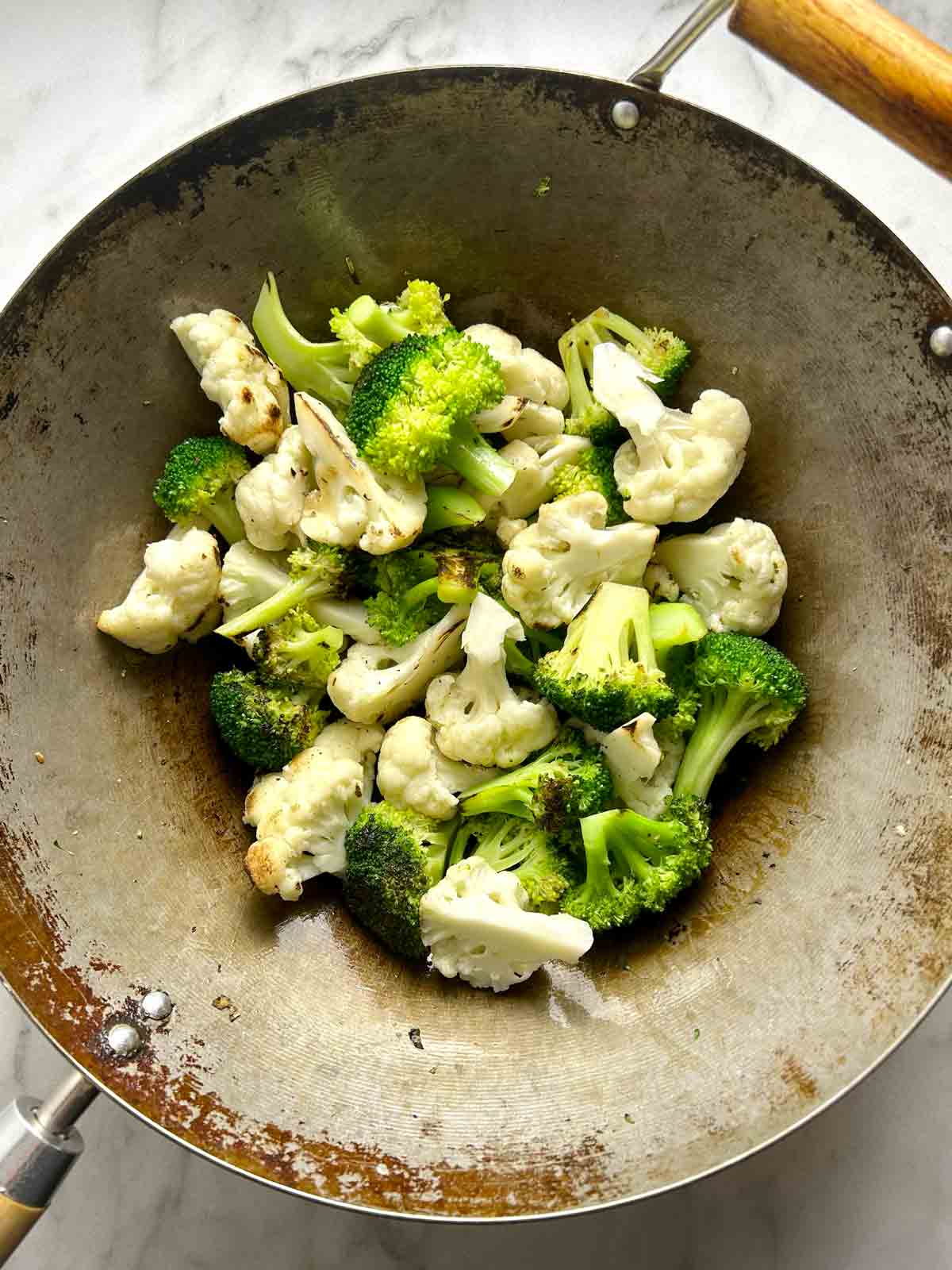 broccoli and cauliflower after being steamed.