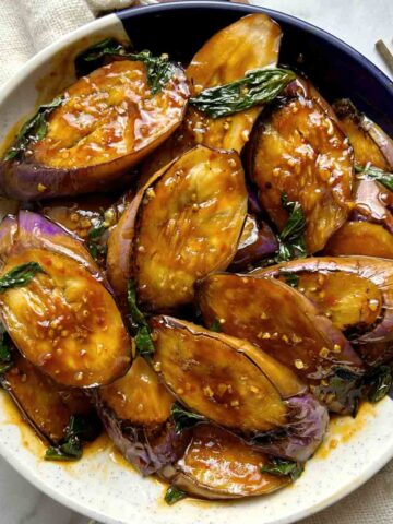 overhead shot of Thai basil eggplant stir-fry on plate.