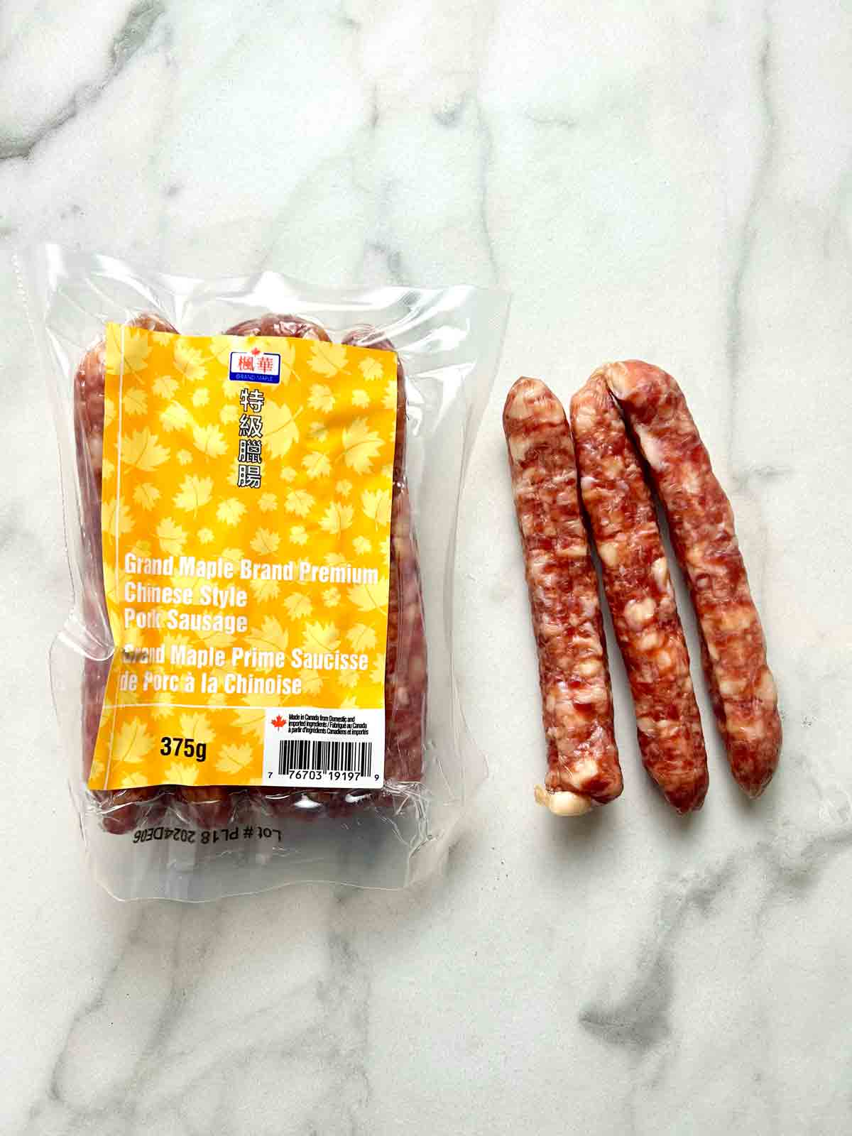 package of Chinese sausage and 3 sausage links.