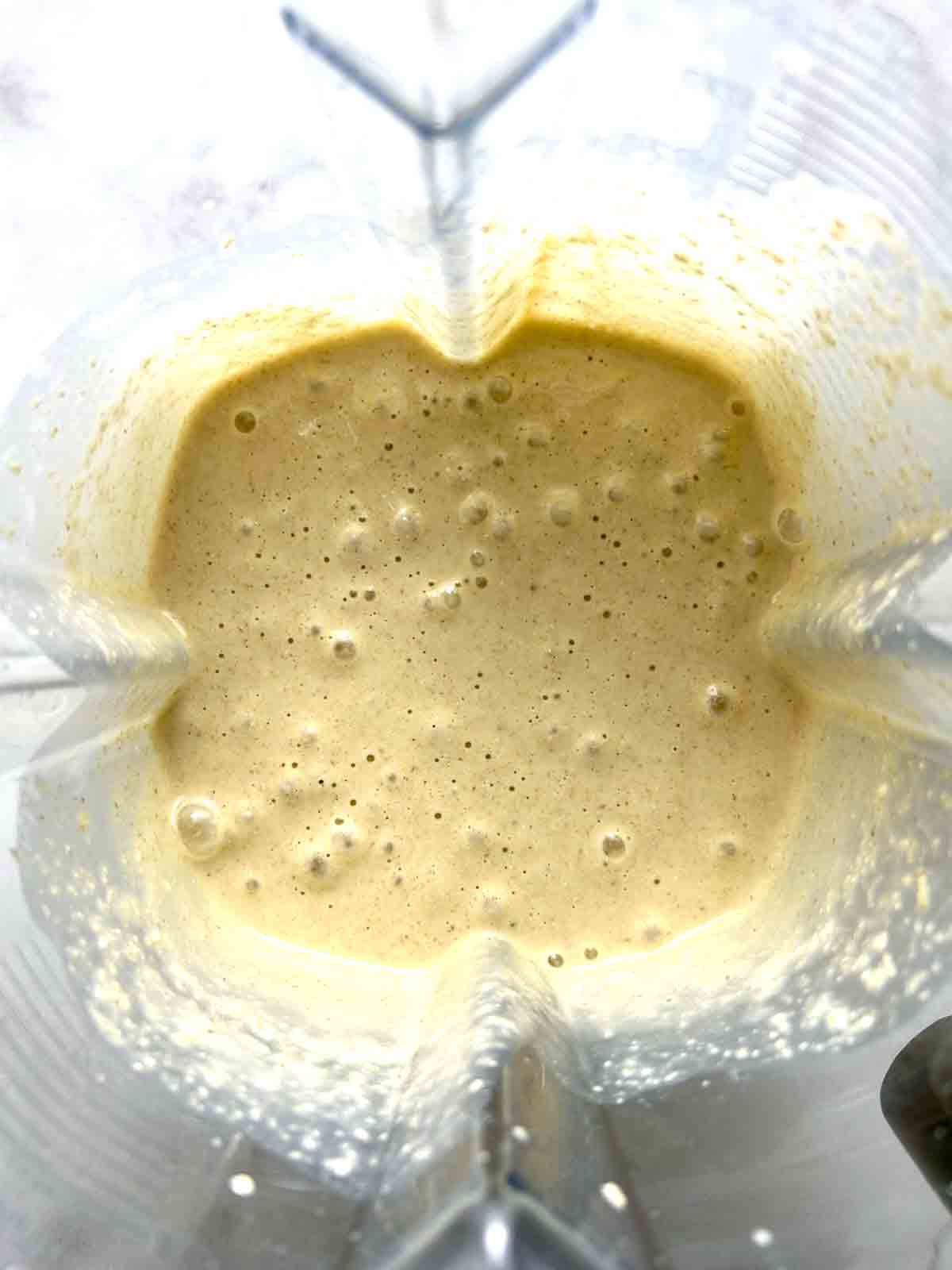 pancake ingredients blended in blender.