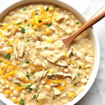 close up of white chicken chili in bowl.