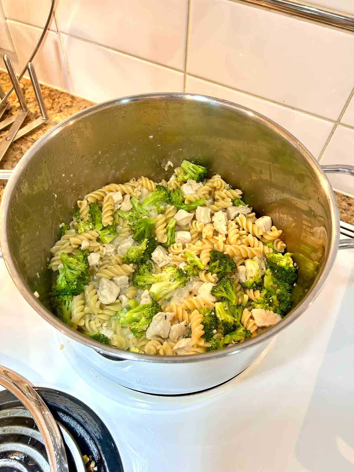 sauce being thickened in pot.