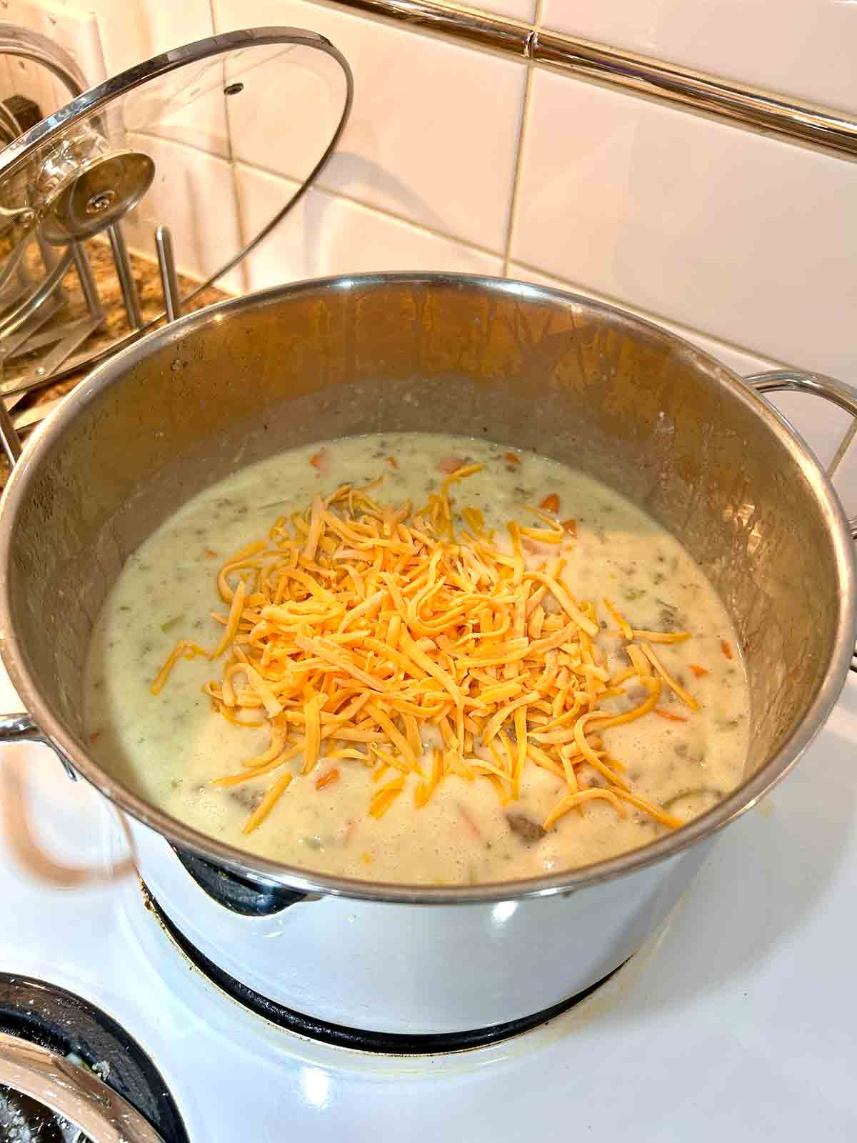 cheddar cheese on top of cheeseburger soup.