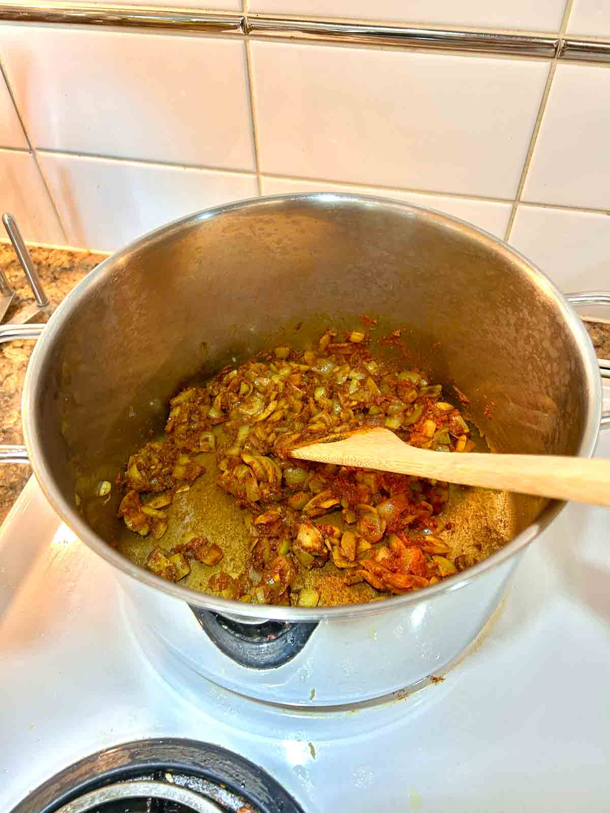 tomato paste added to pot.