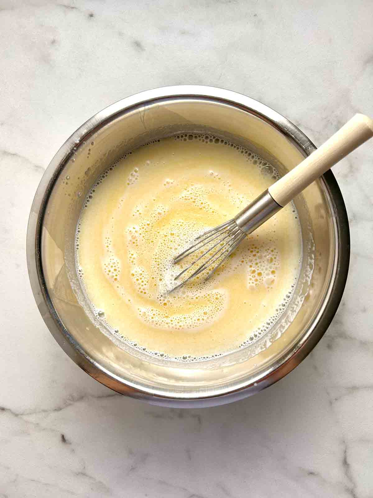 wet ingredients mixed together in bowl.