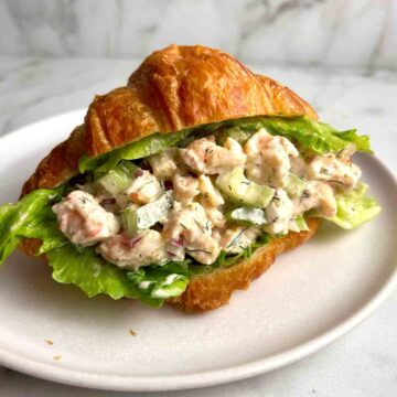 chopped shrimp salad in croissant.