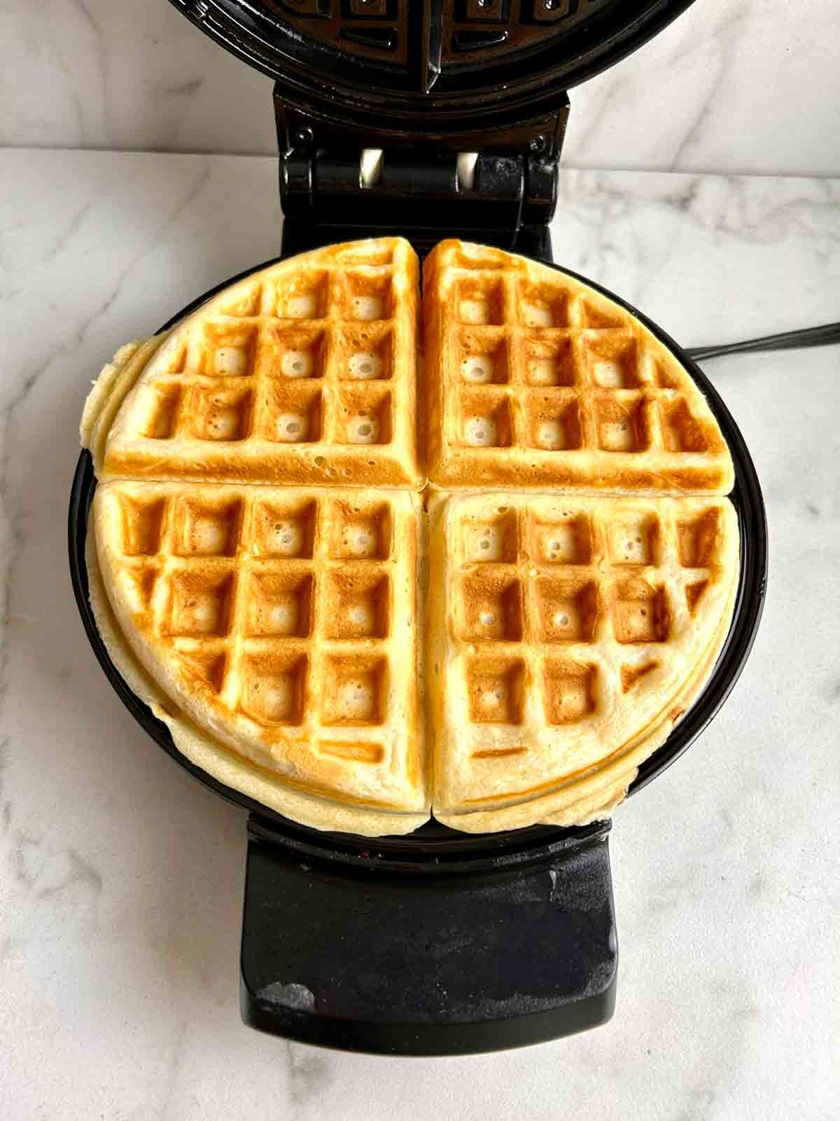 waffle golden brown in waffle iron.