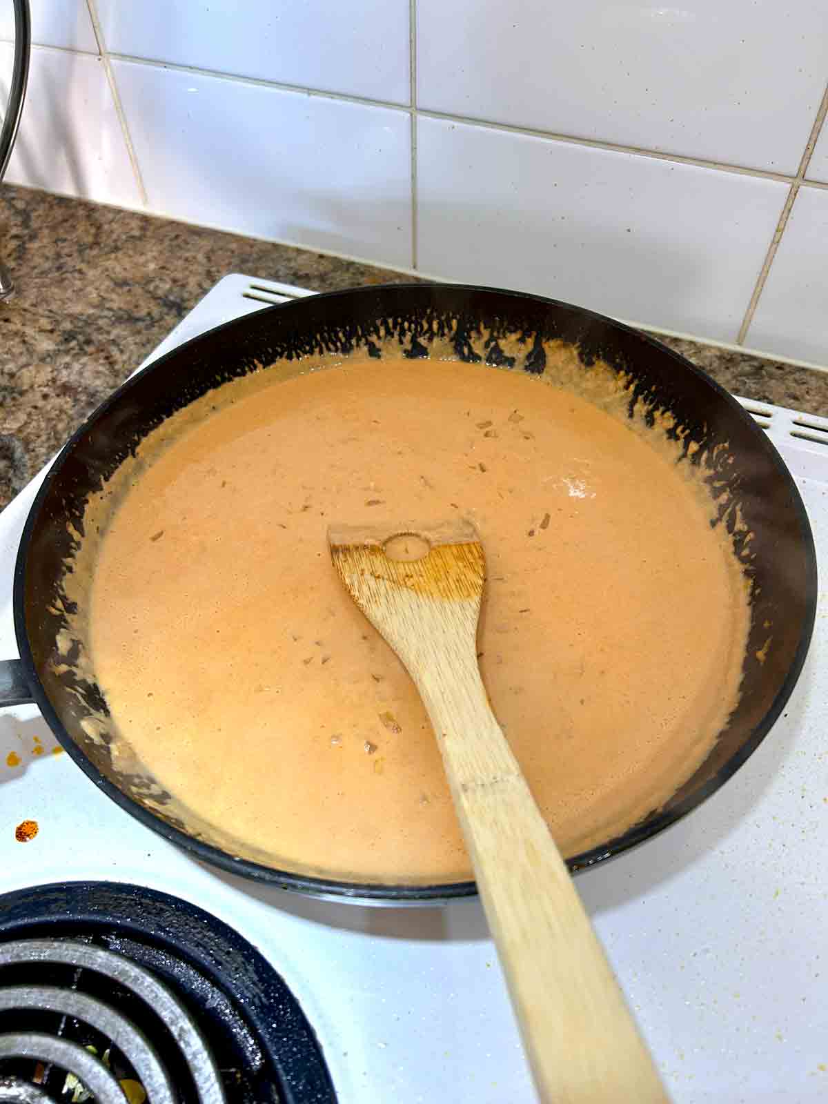heavy cream added to pan.