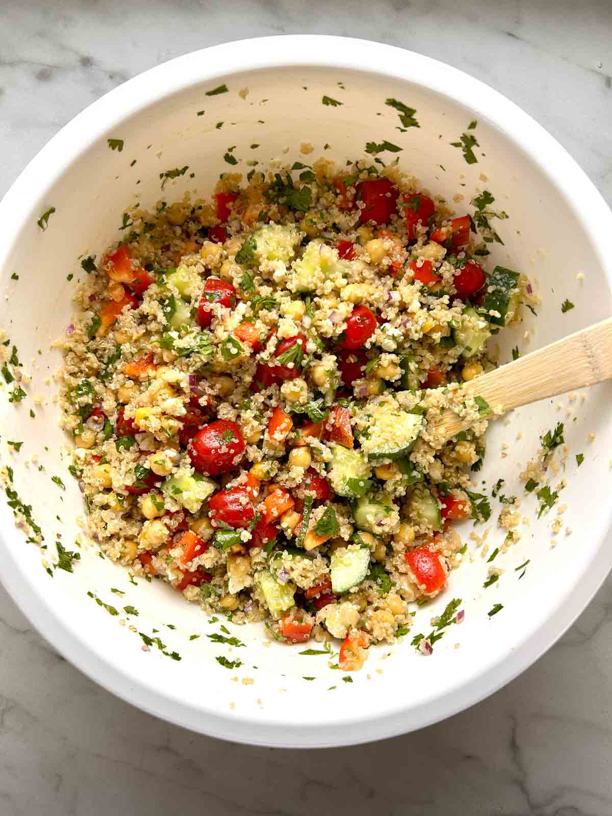 quinoa salad mixed in bowl.