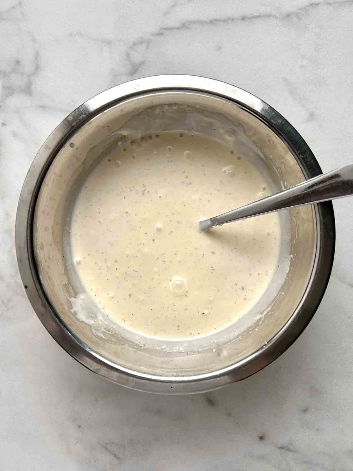 dressing mixed in bowl.