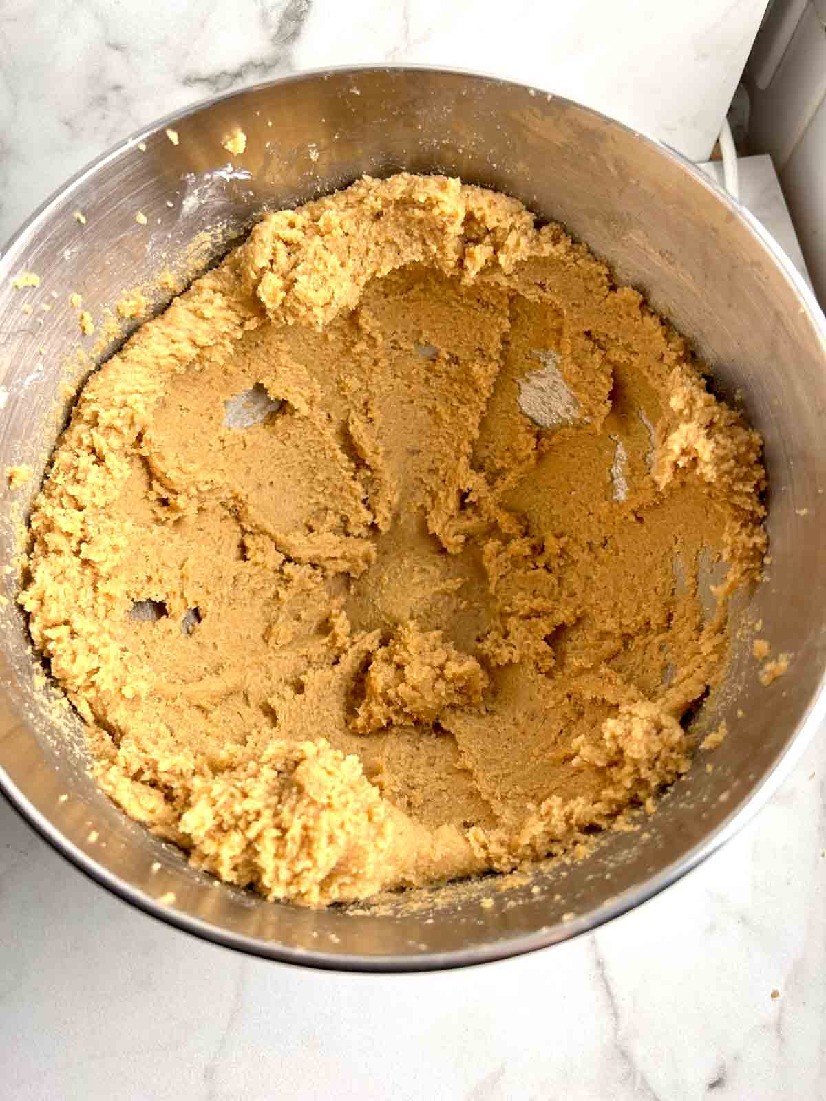 butter and sugars creamed in mixture bowl.