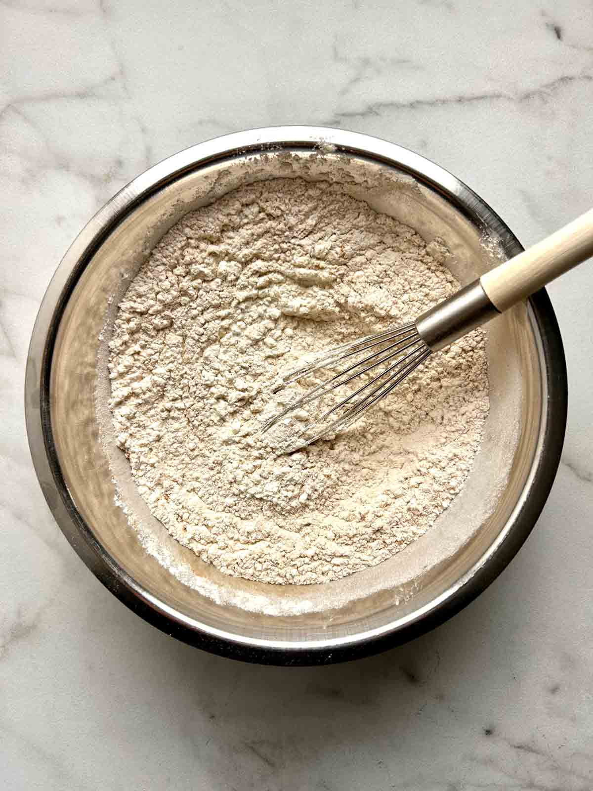 flour mixture whisked in bowl.