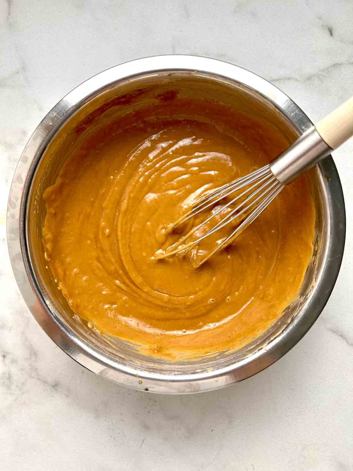 water whisked into sauce.