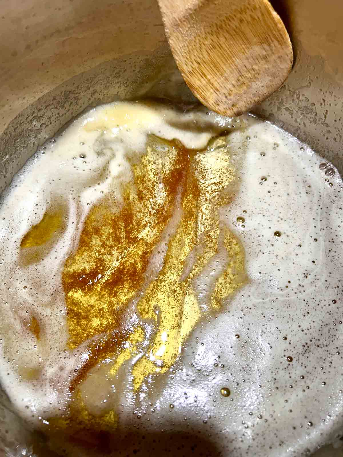 close up showing browned milk proteins in butter.