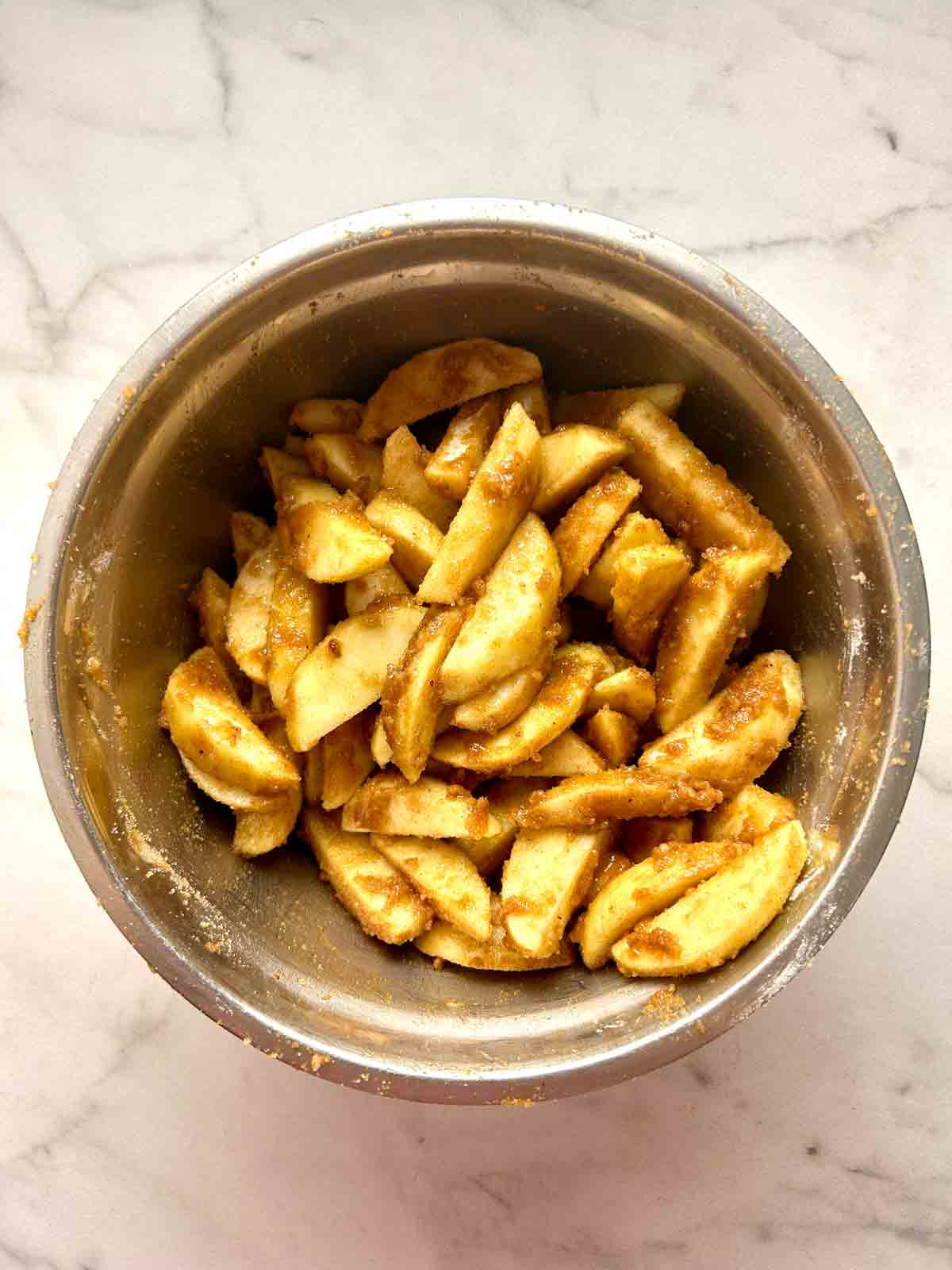 apples tossed with filling ingredients.