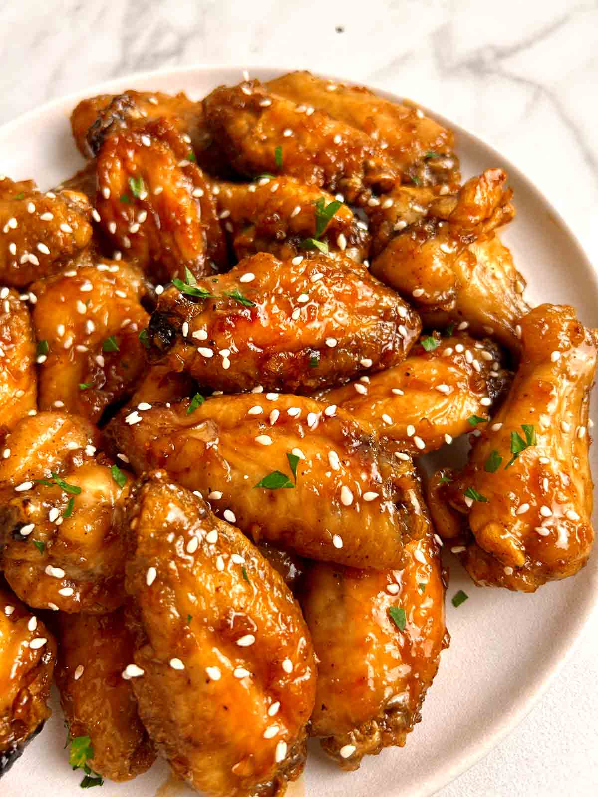 close up of honey garlic chicken wings.