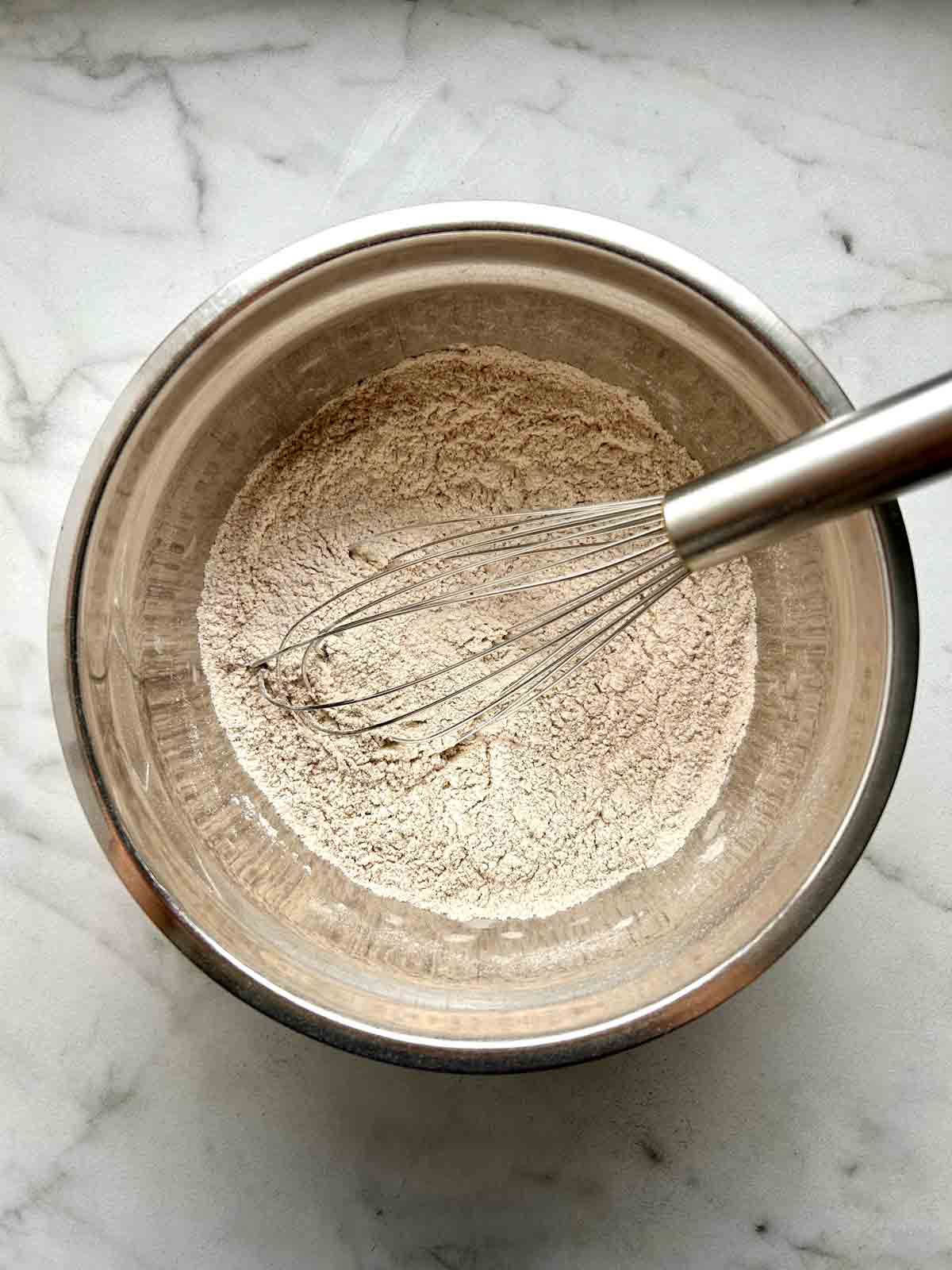 dry ingredients whisked in bowl.