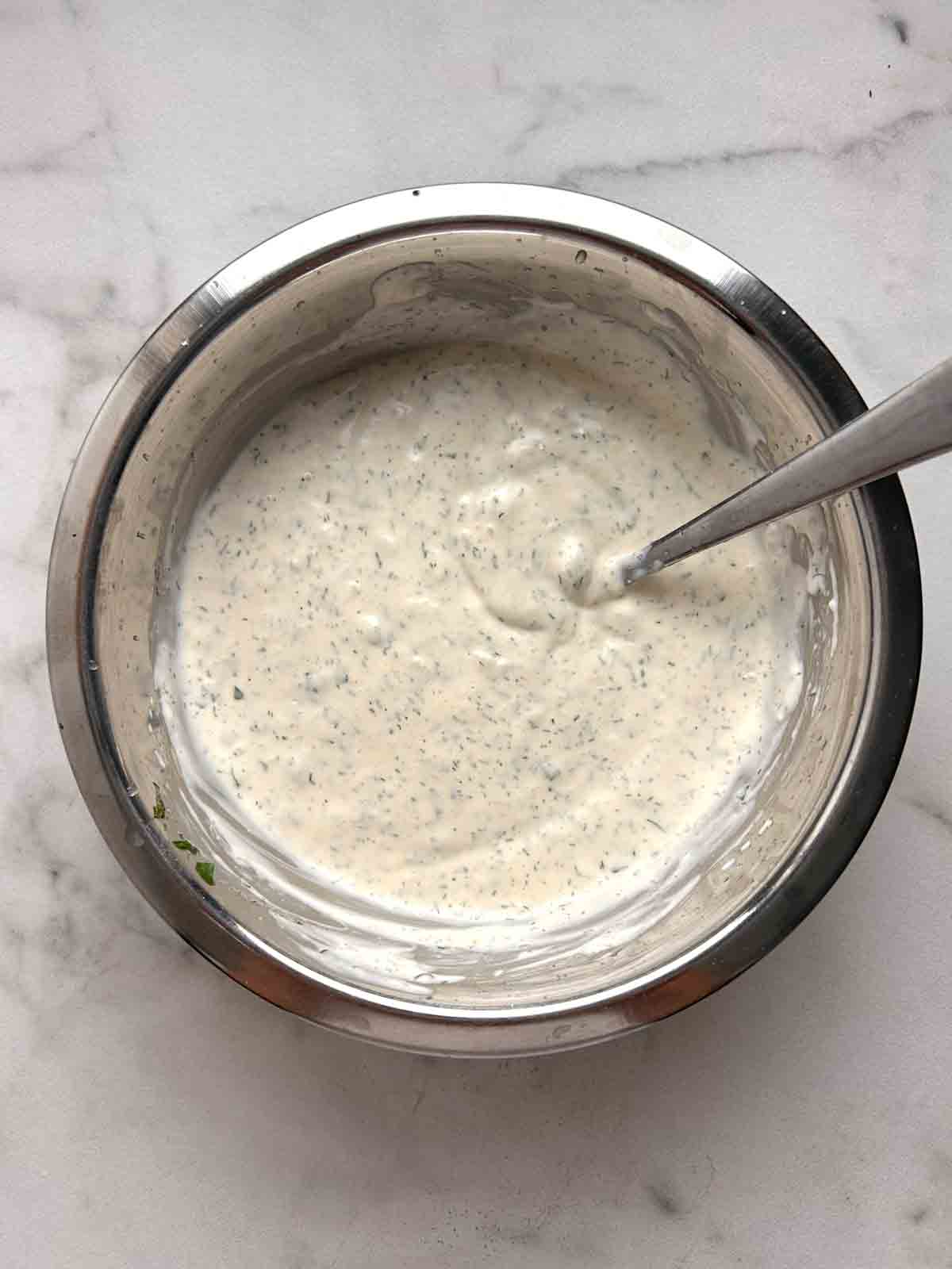 dressing mixed in bowl.