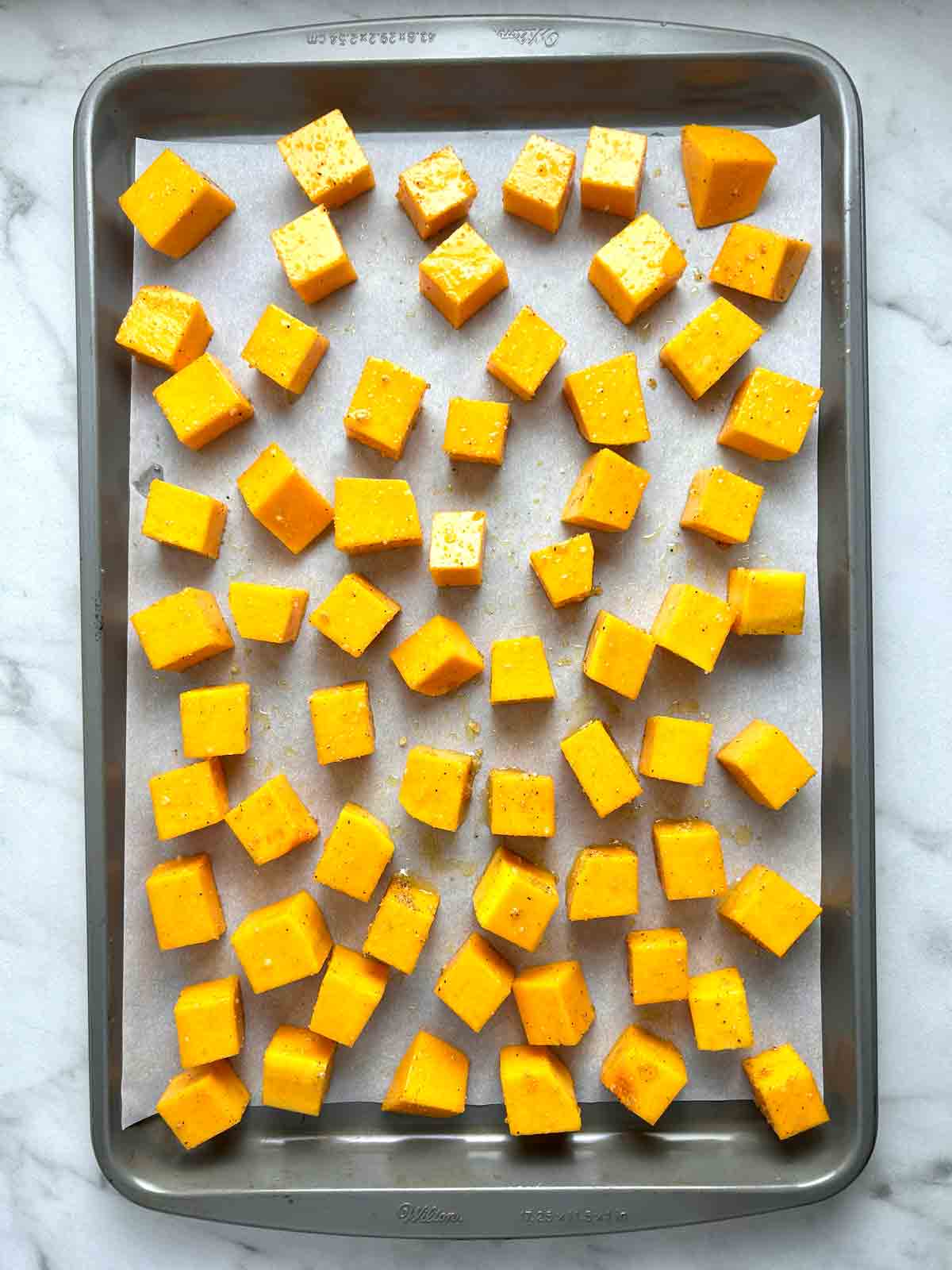 squash spread onto baking pan.