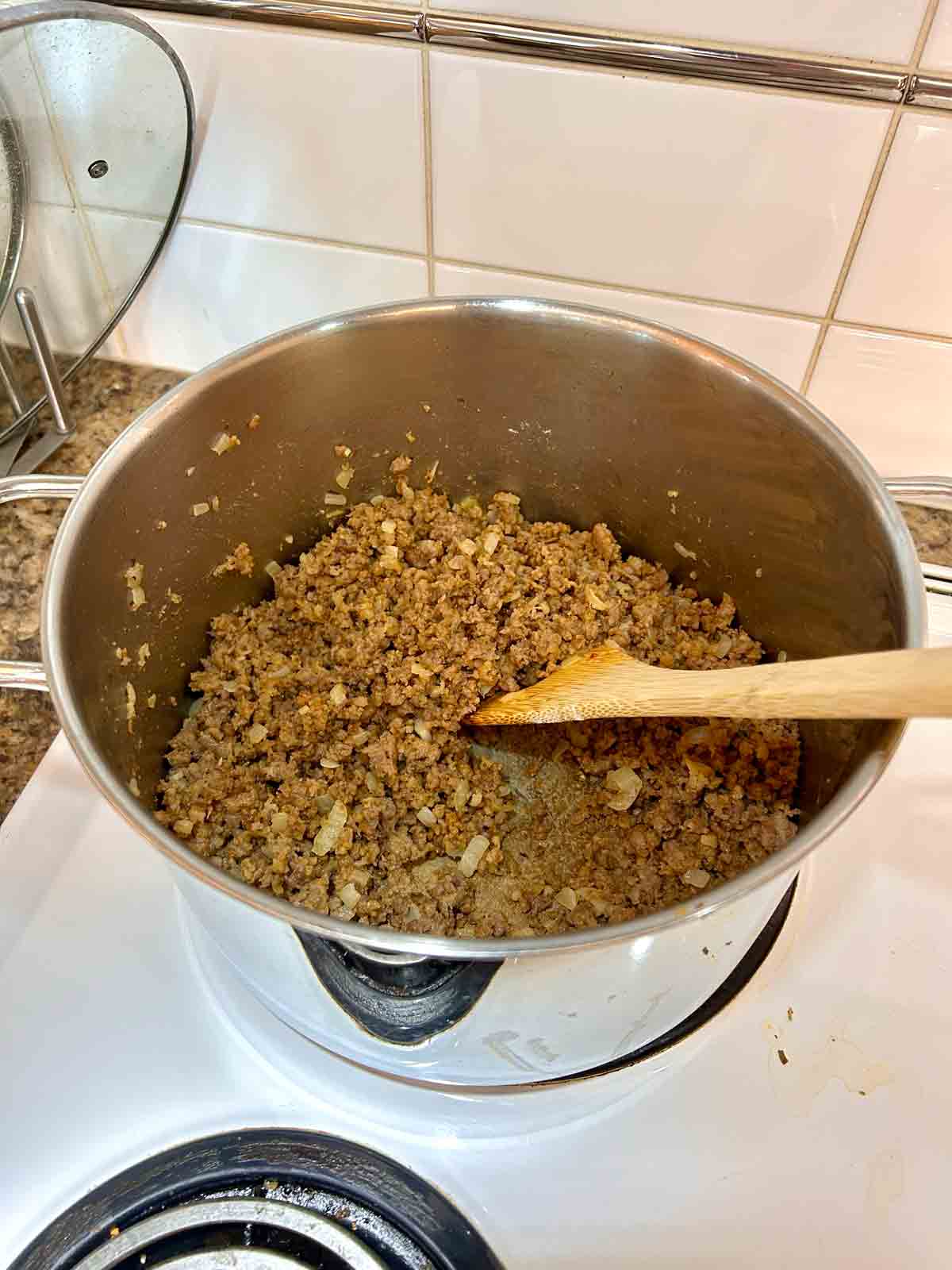flour stirred in sausage mixture.