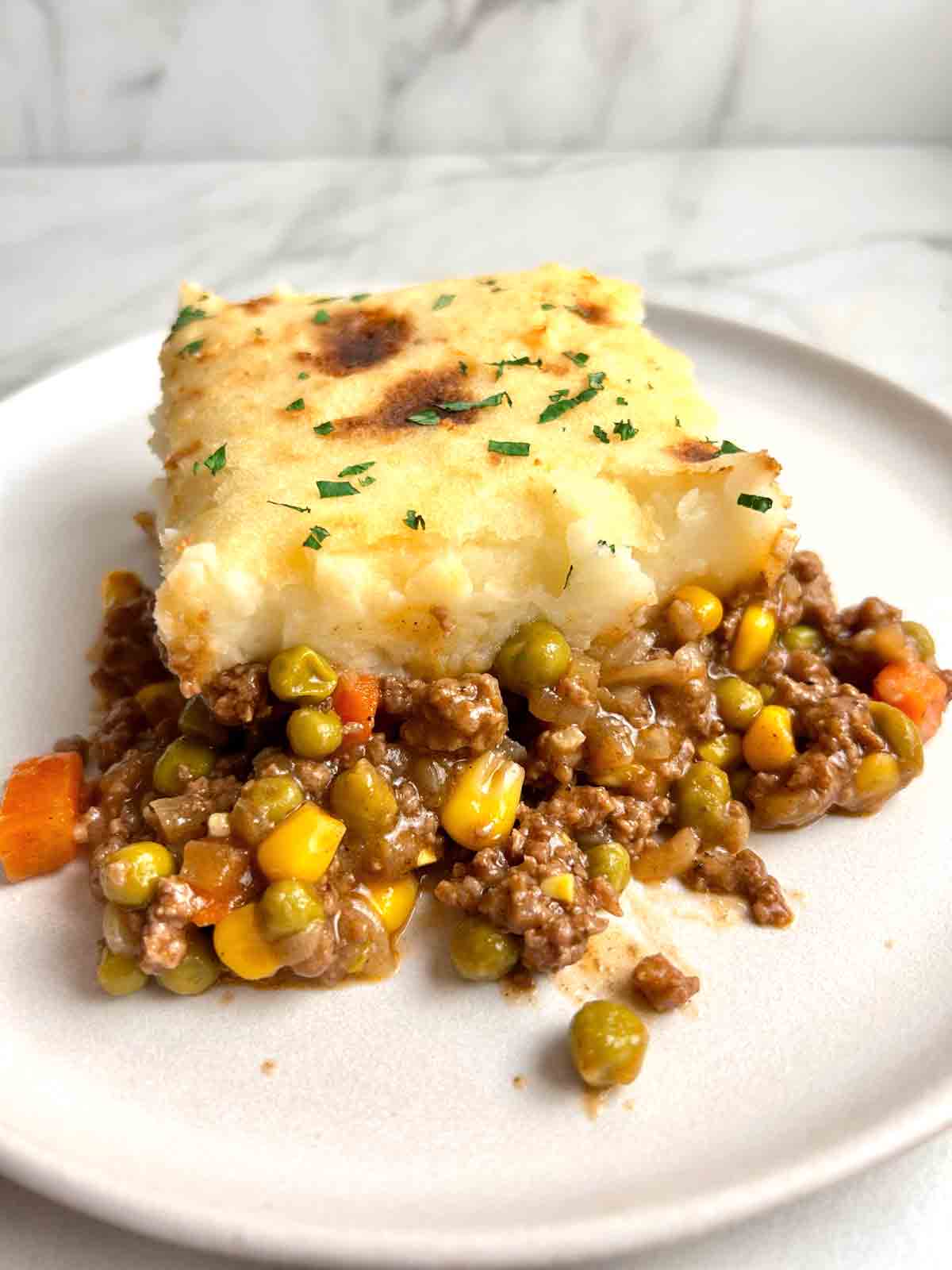 slice of shepherd's pie on plate.