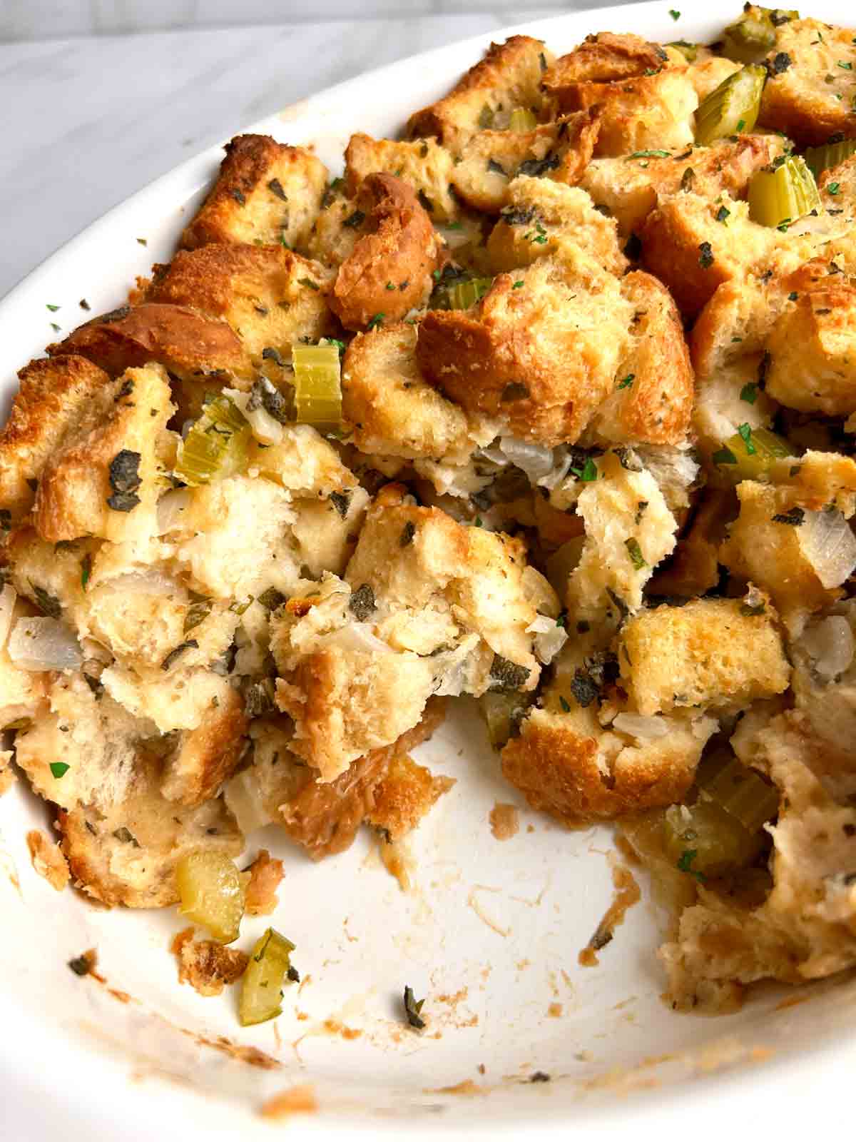 close up of stuffing in casserole dish.