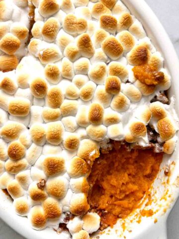 sweet potato casserole with portion scooped out.
