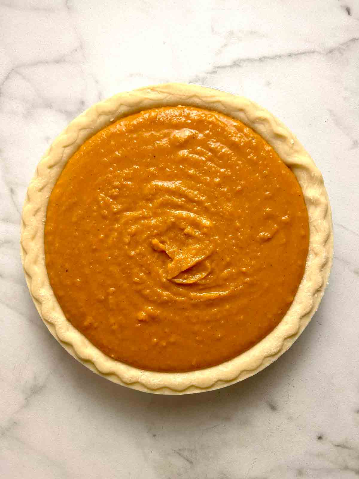 filling poured into pie crust.
