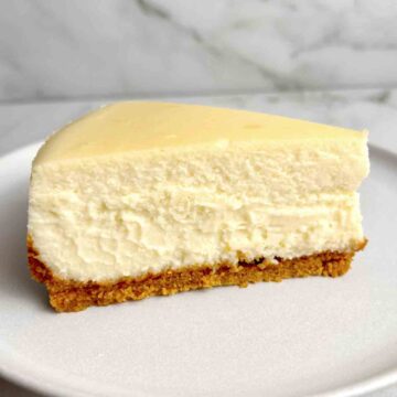 slice of cheesecake on plate.