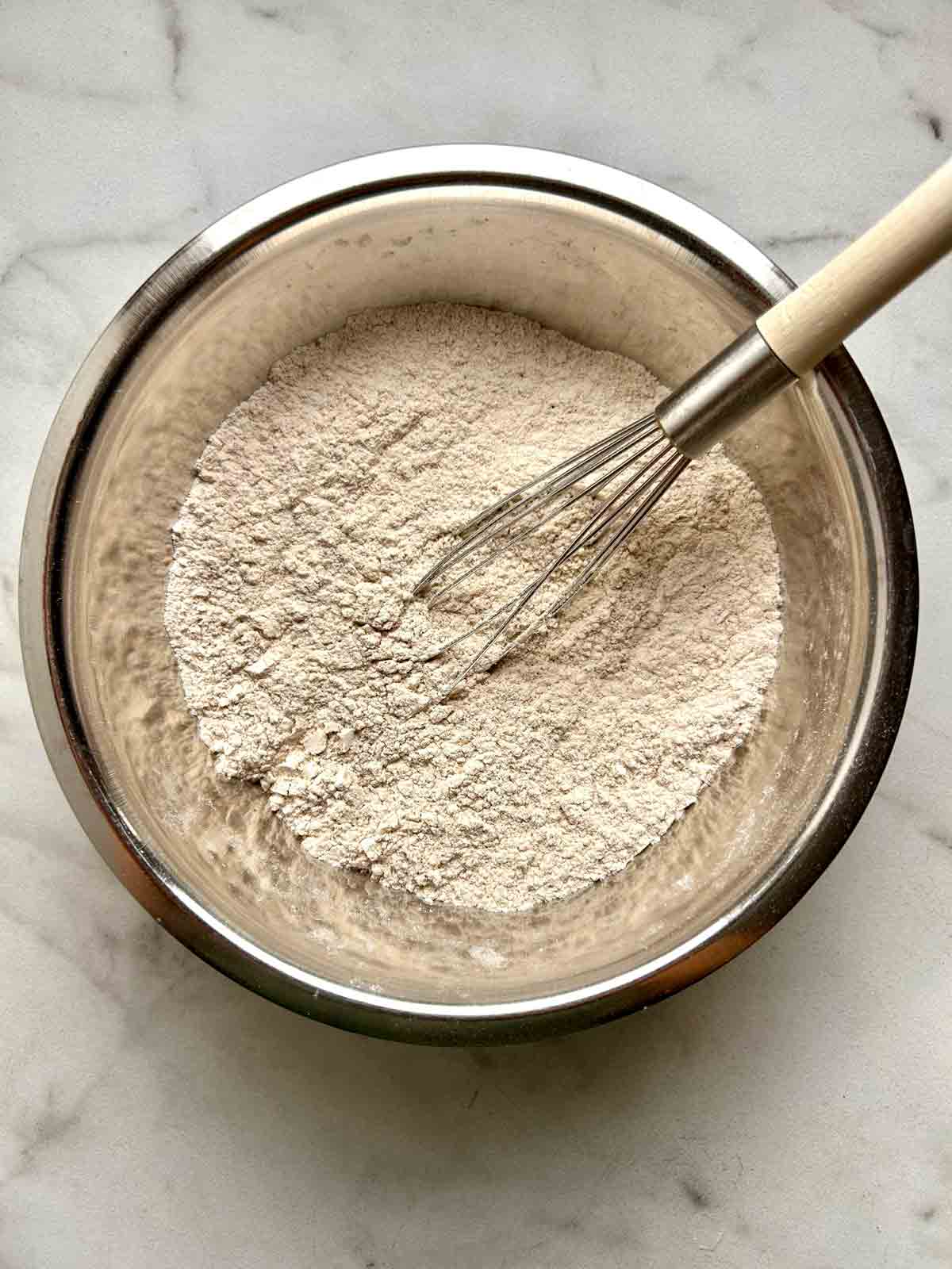 dry flour mixture whisked in bowl.