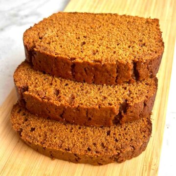 3 slices of gingerbread stack on top of each other.