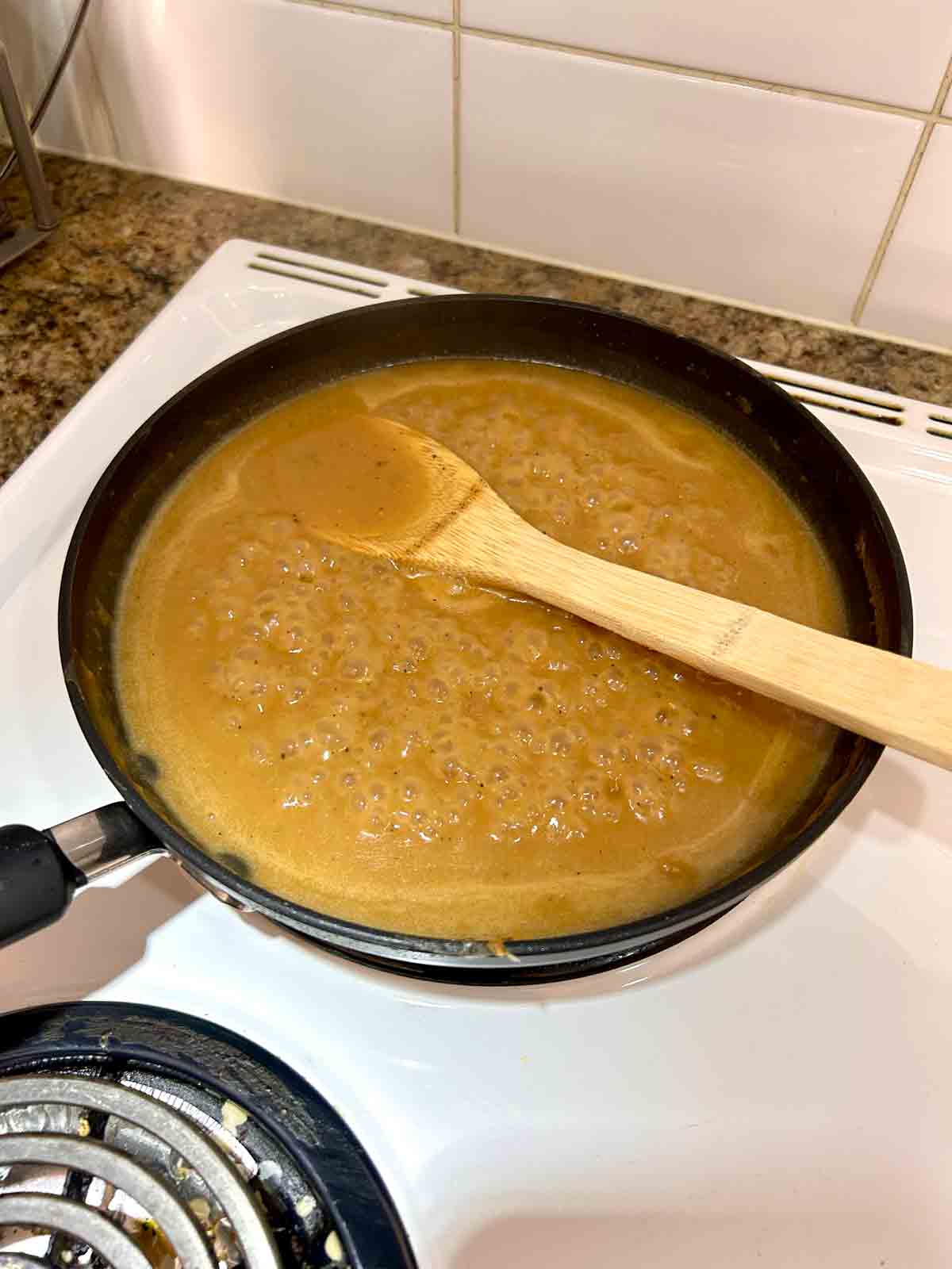 beef broth added; gravy simmering for a few minutes.