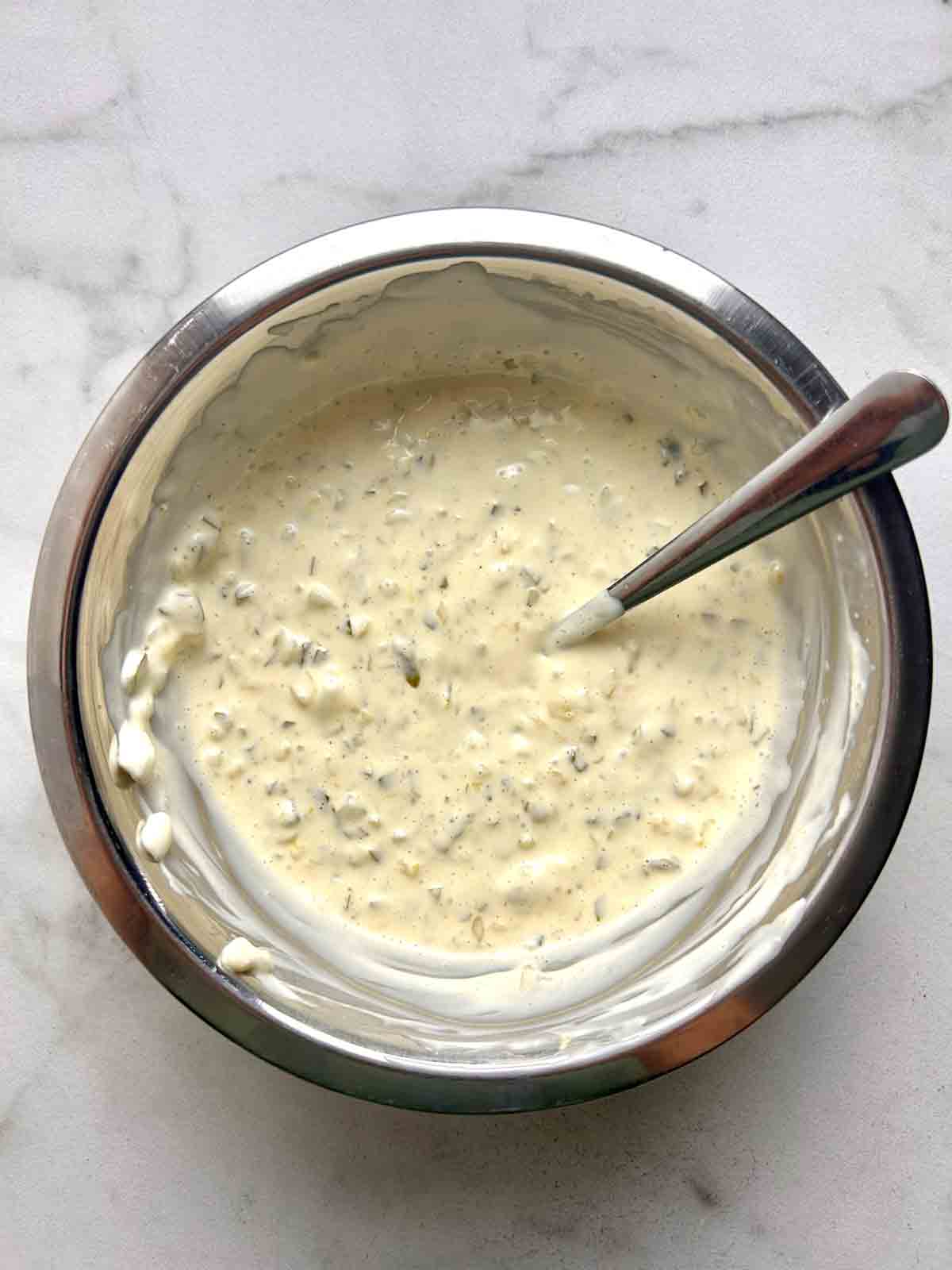 tartar sauce mixed together in bowl.