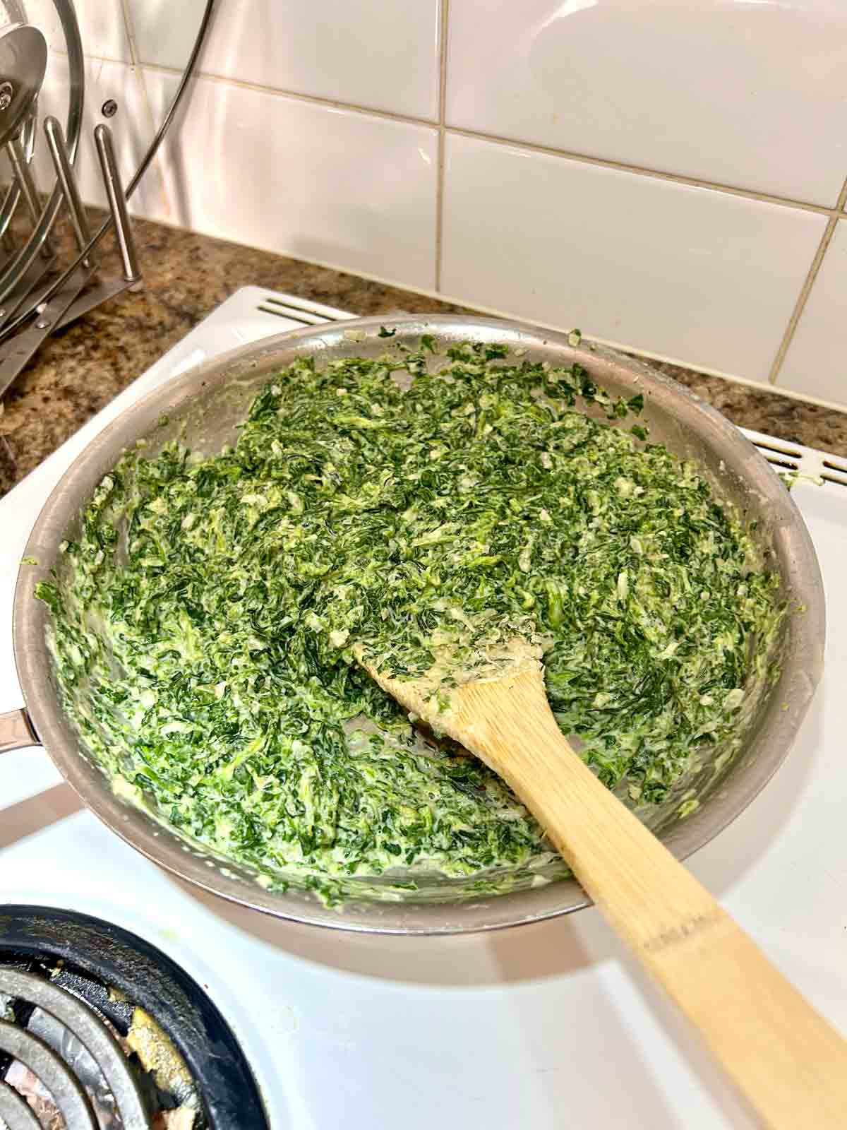 spinach stirred into cream sauce.