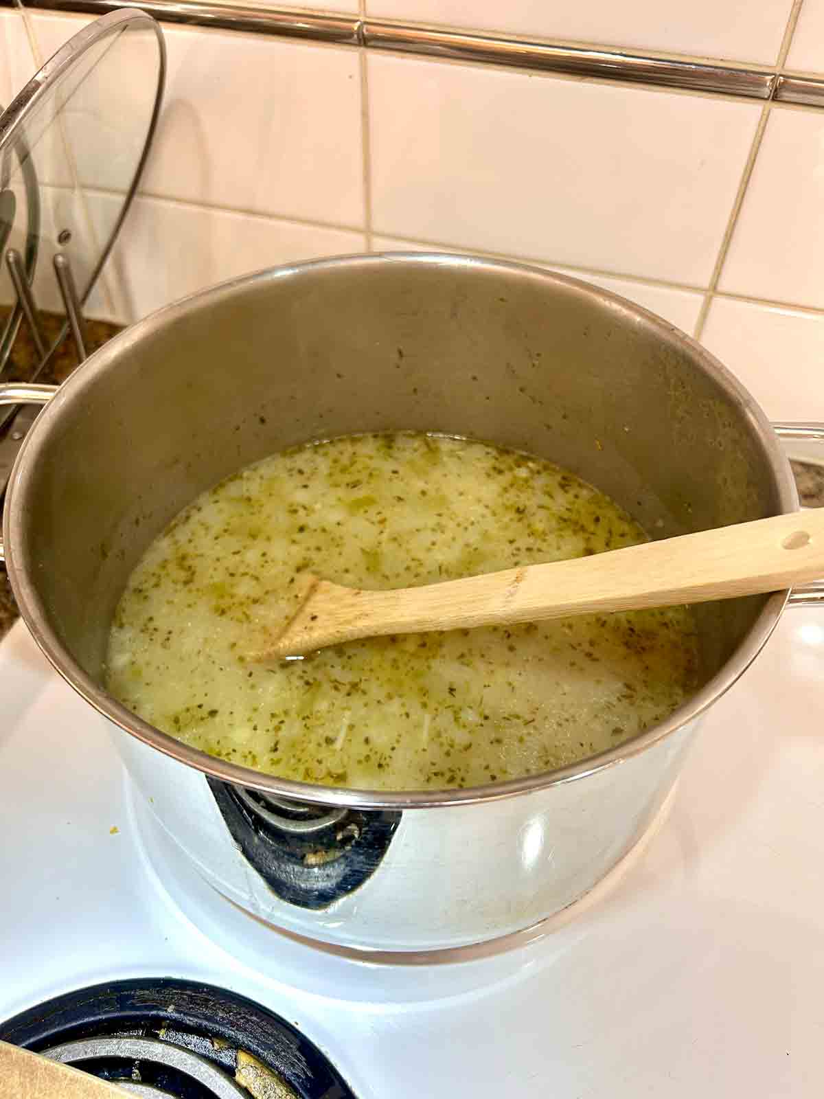 broth, chicken, and gnocchi added to pot.