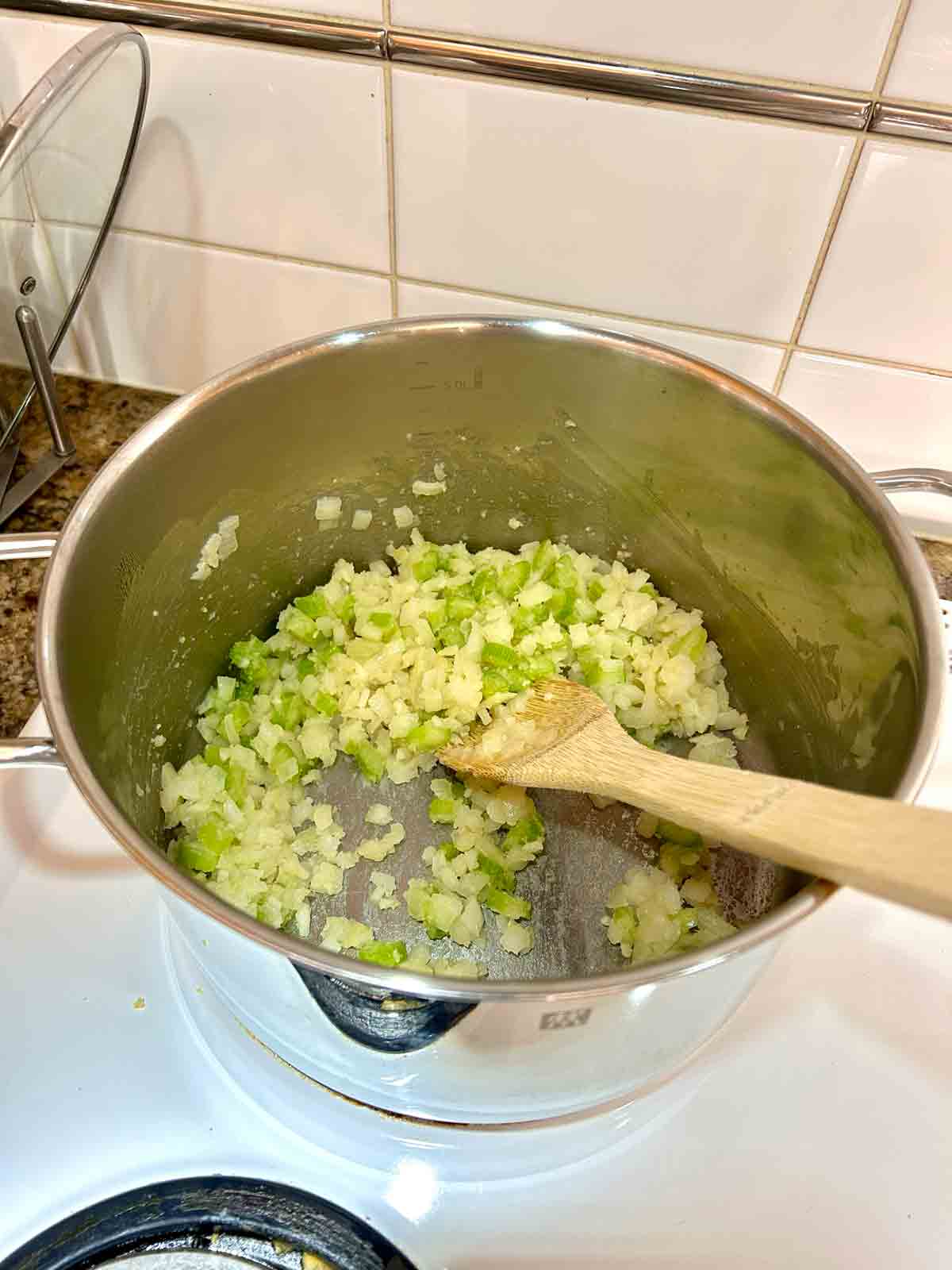 flour stirred into onions, garlic, and celery.