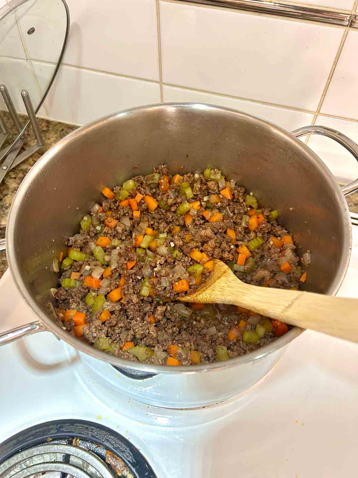 red wine being reduced in pot.