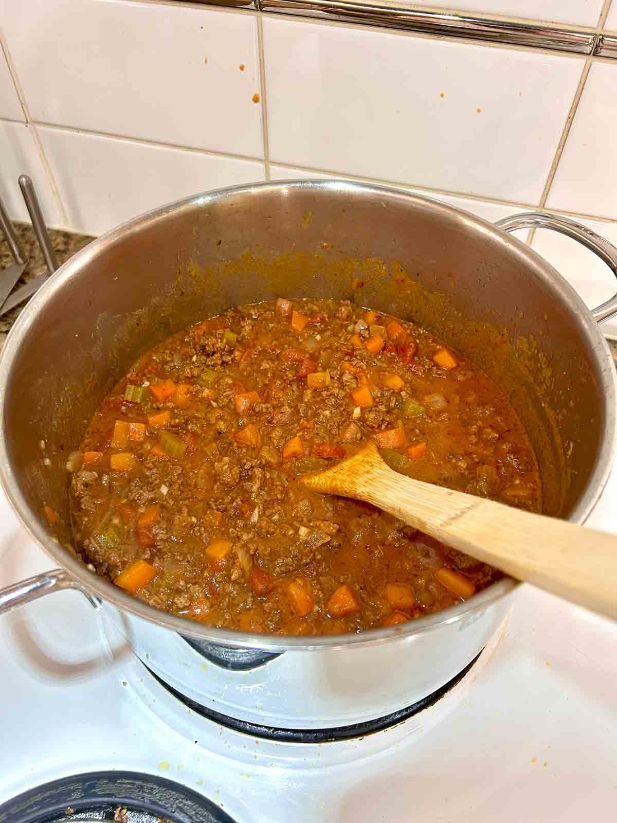 sauce simmering in pot.