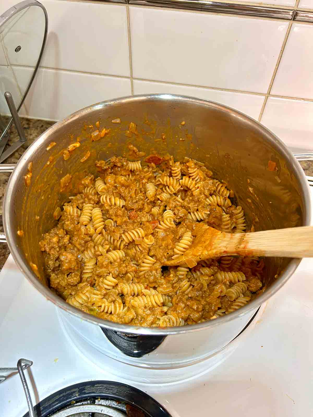 cheddar cheese stirred into pasta.