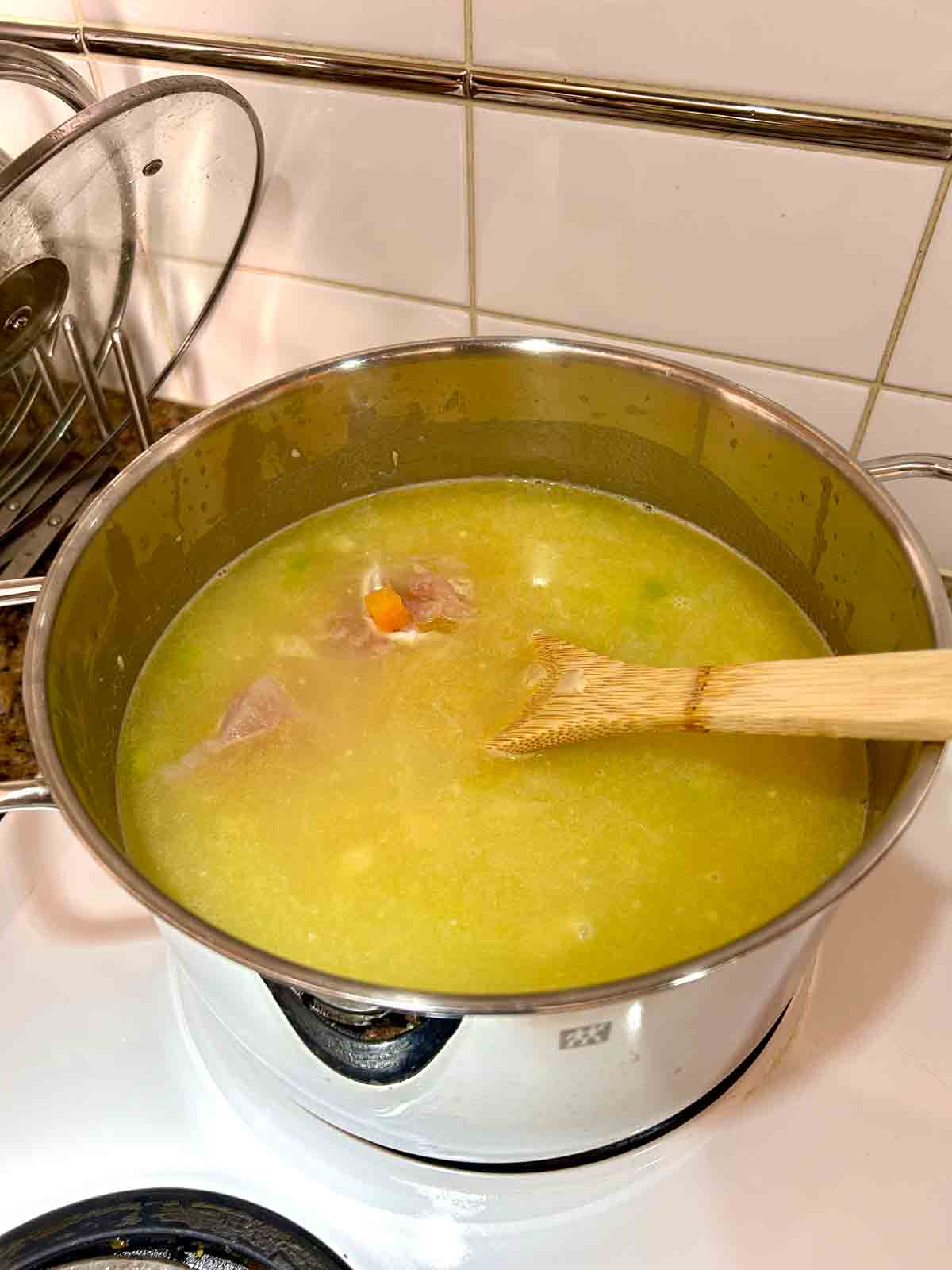 broth, chicken, and rice added to soup.