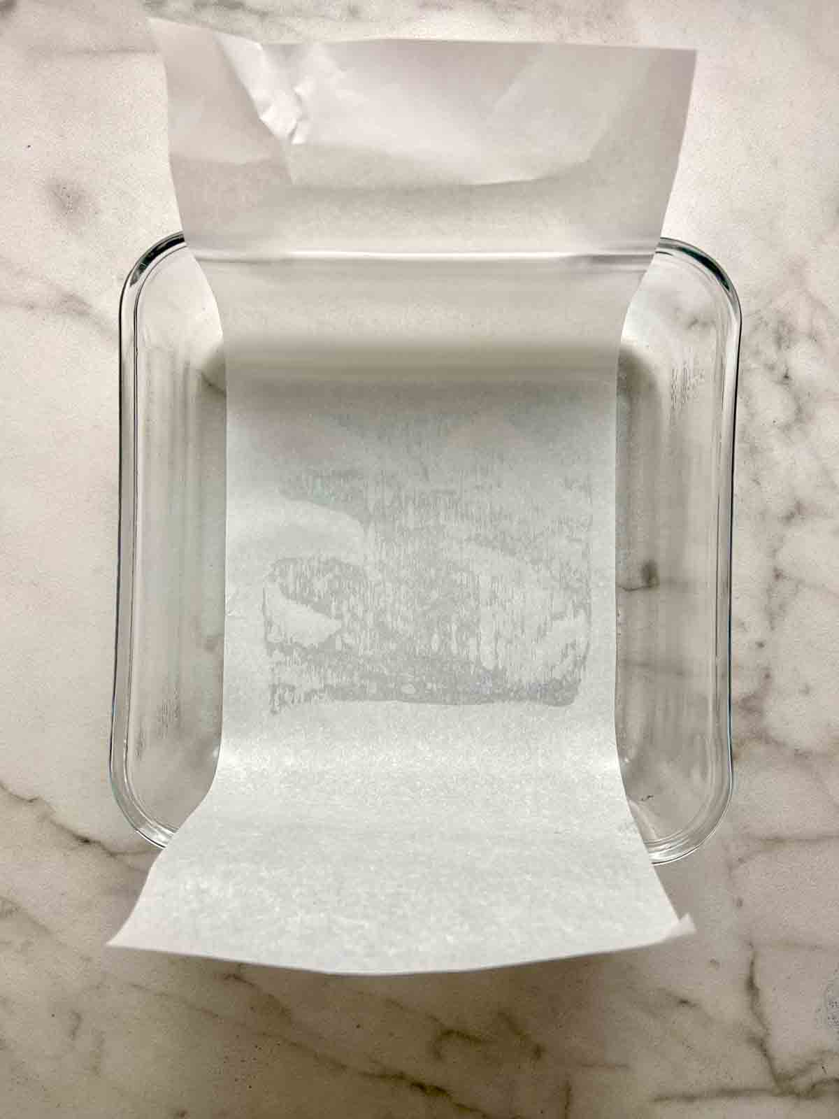 parchment paper lined in baking dish.
