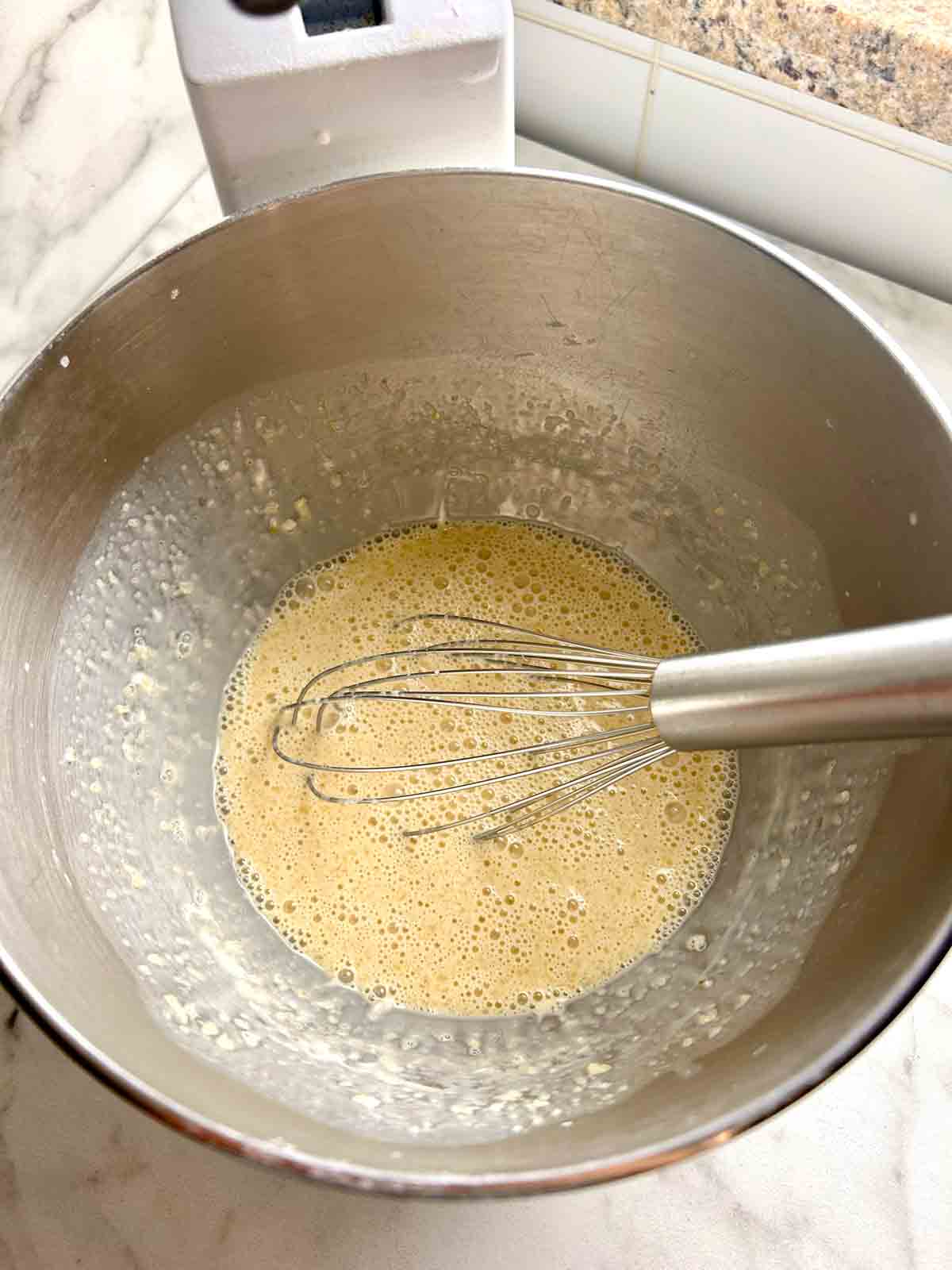 wet ingredients whisked in stand mixer bowl.