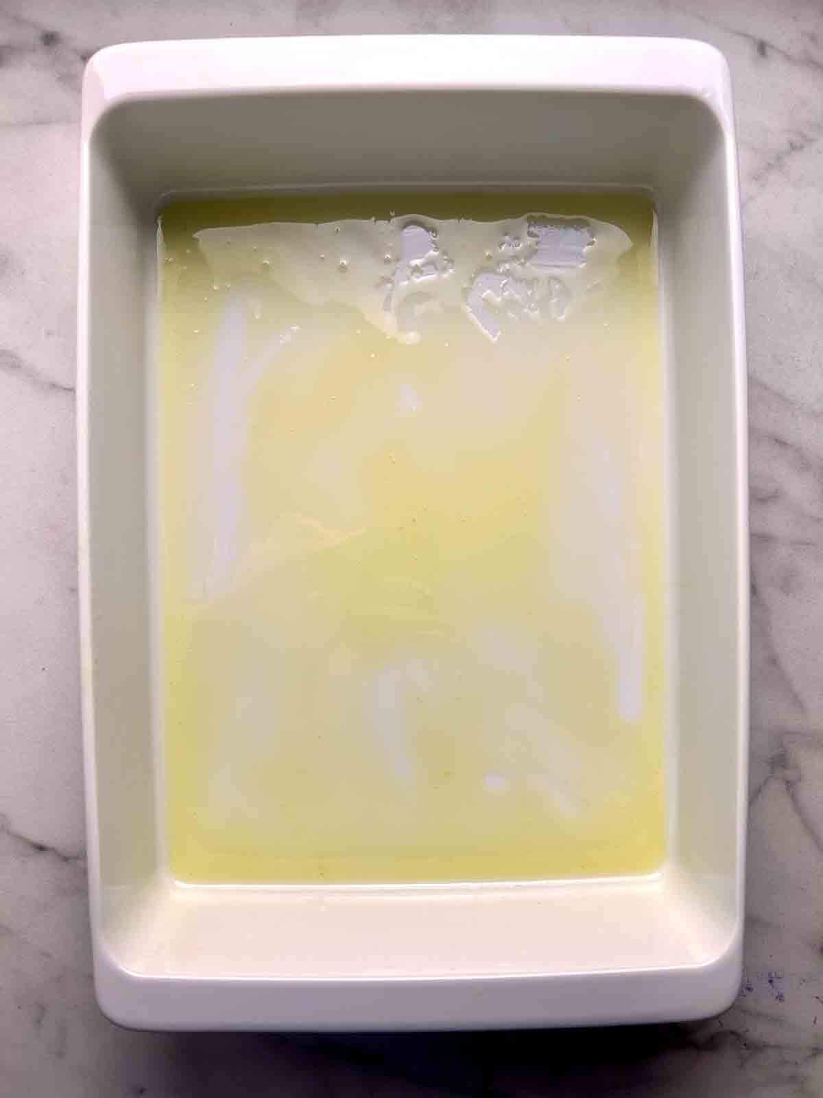 olive oil spread all over baking dish.