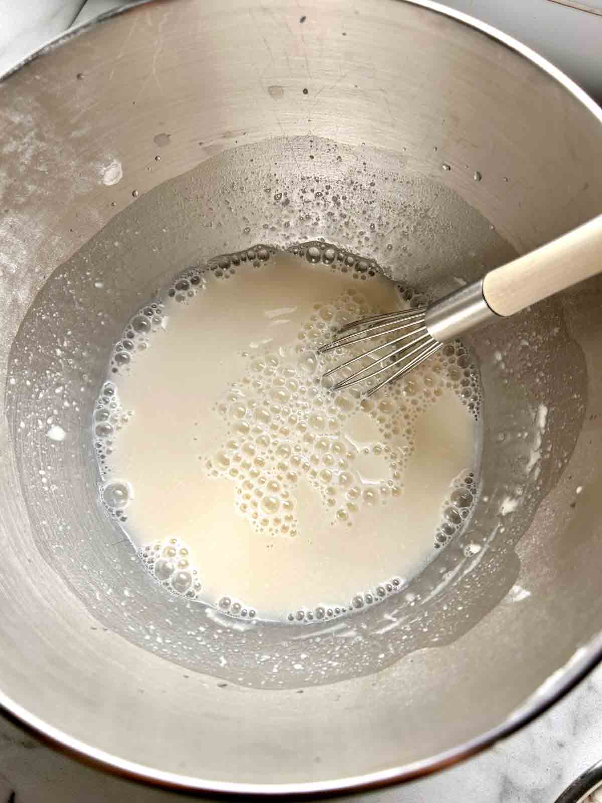 wet mixture combined in stand mixer bowl.