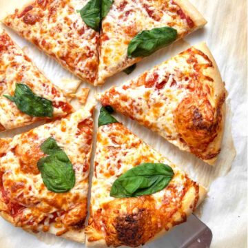 close up of baked sourdough crust pizza.
