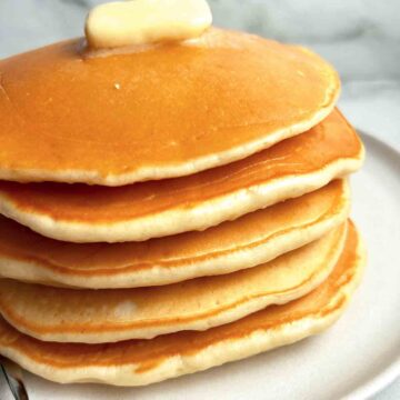stack of McDonald's pancakes on plate.